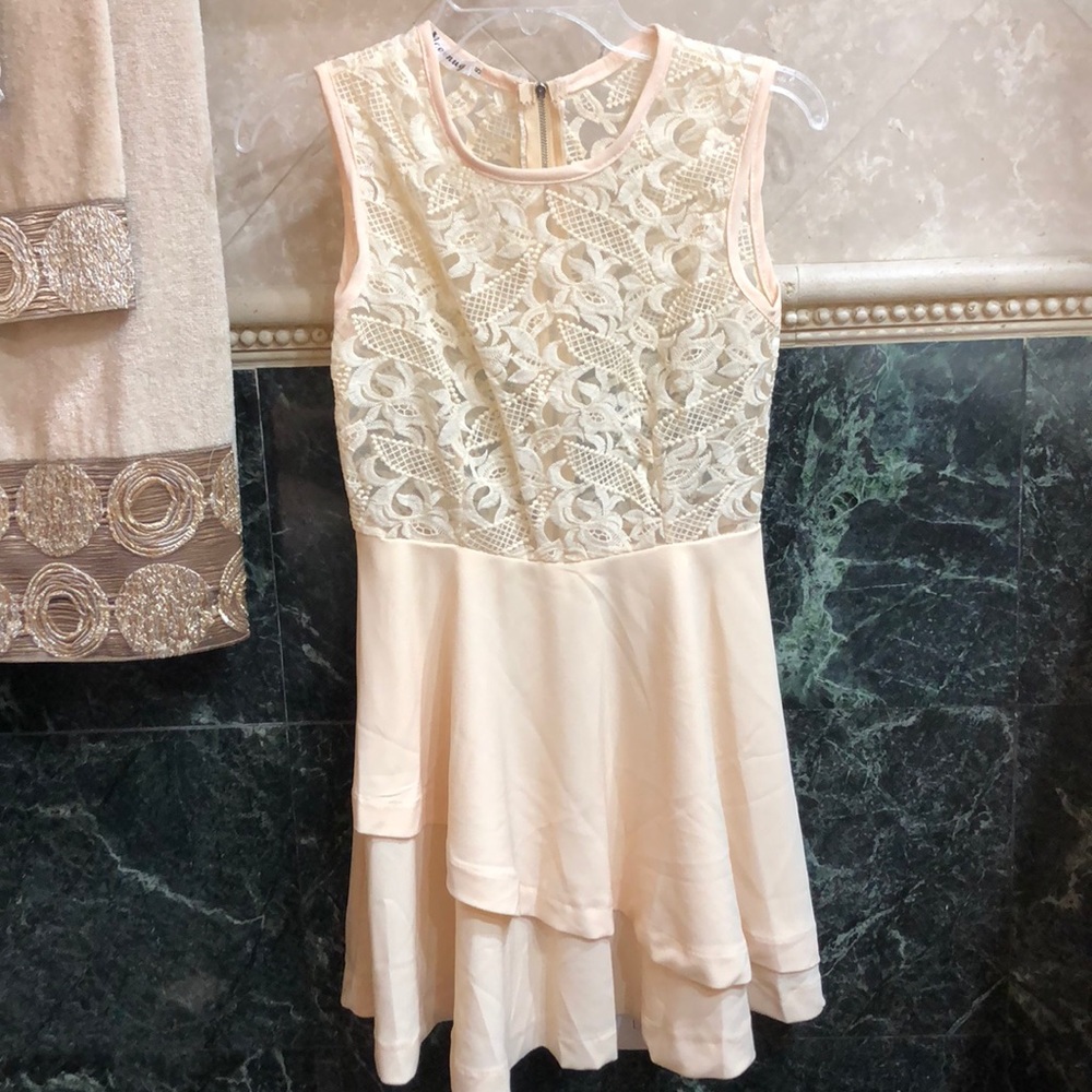 Cream colored fit and flare dress